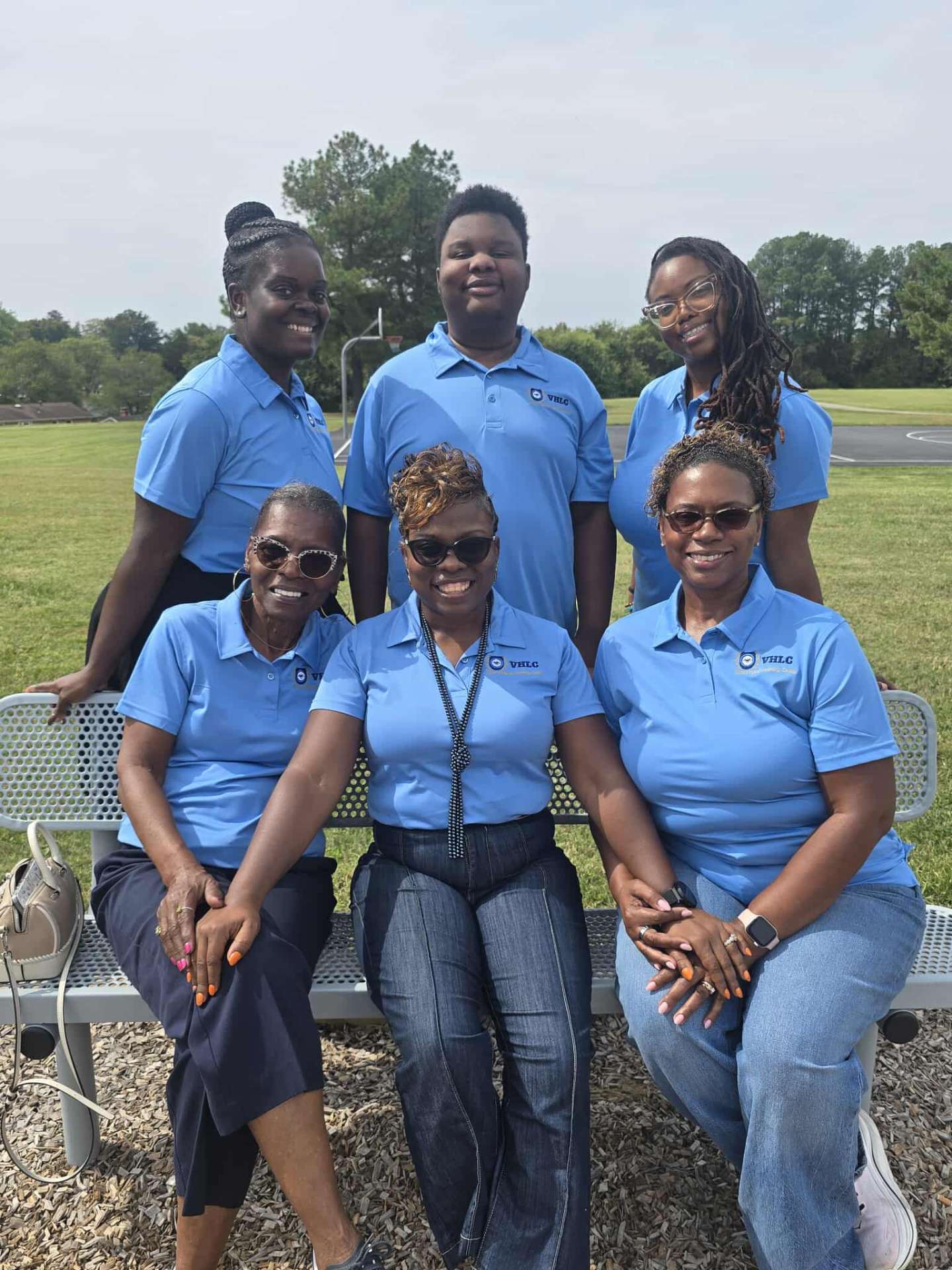 VHLC staff team in matching polos